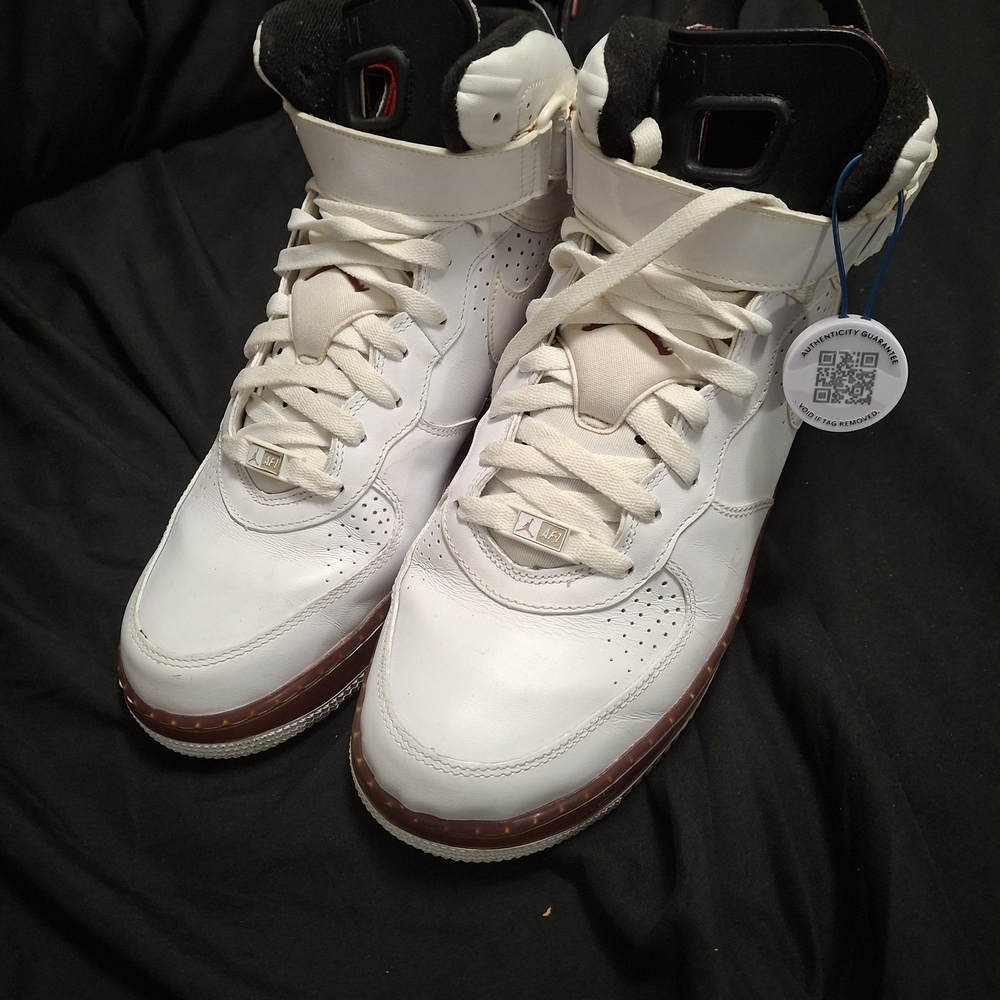 Jordan White and Black High-Top Athletic Shoes